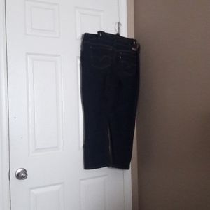 Levi's capris . Size 32 is equivalent to a  Women's size 14. NWOT